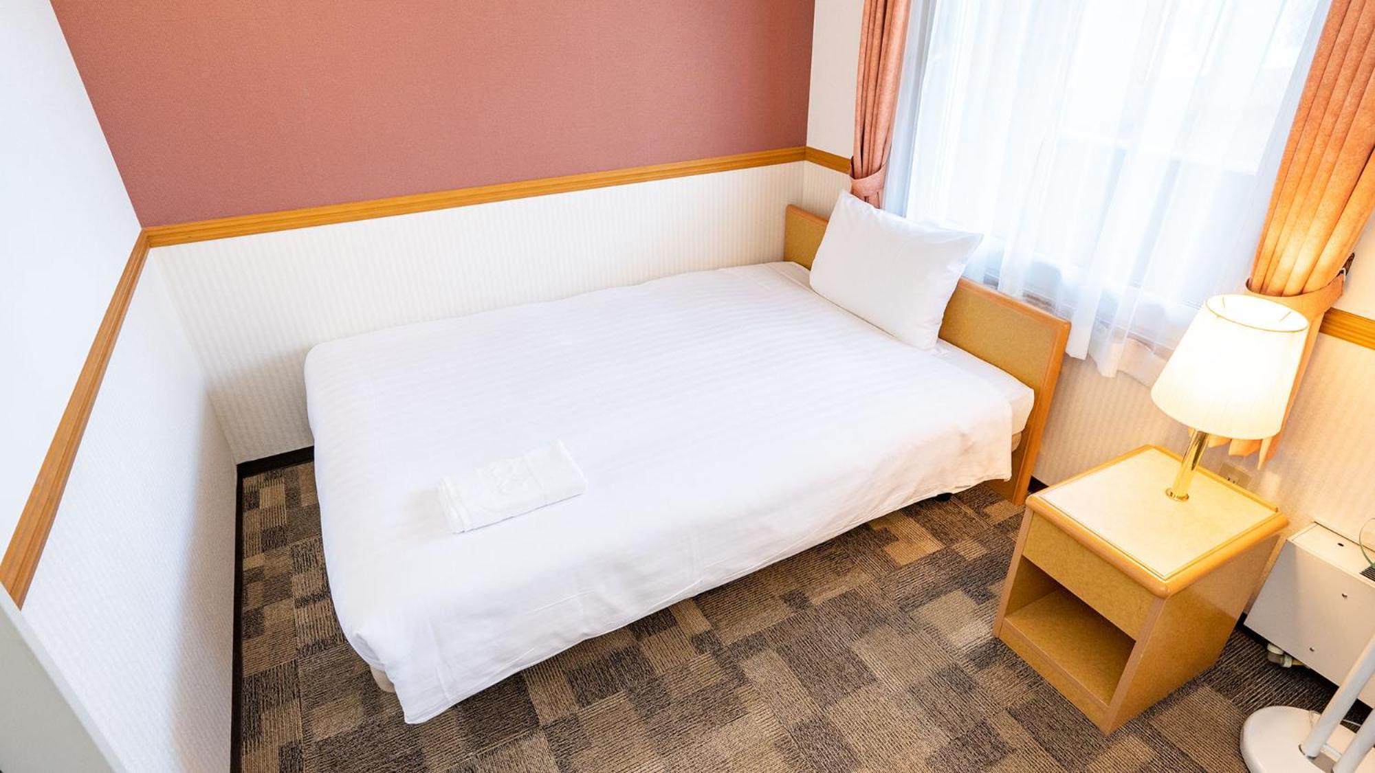Toyoko Inn Nagoya Owari Ichinomiya Ekimae Quarto foto